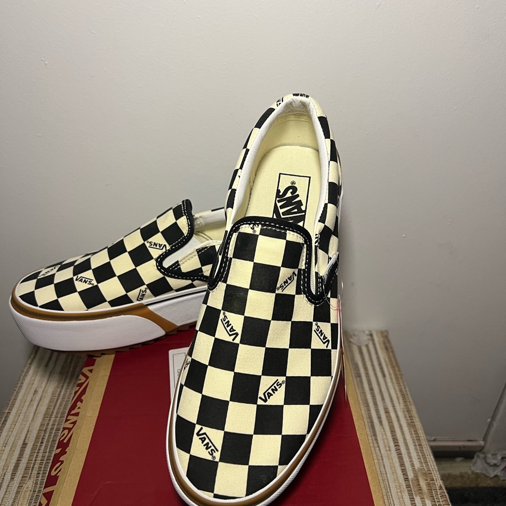 Vans Checkerboard Platform Slip-On Sneakers in Black and Cream